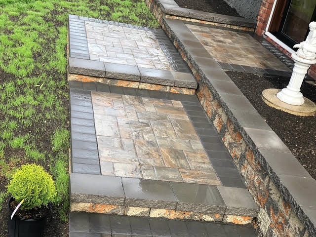 Natural stone front landing and walkway with bluestone treads