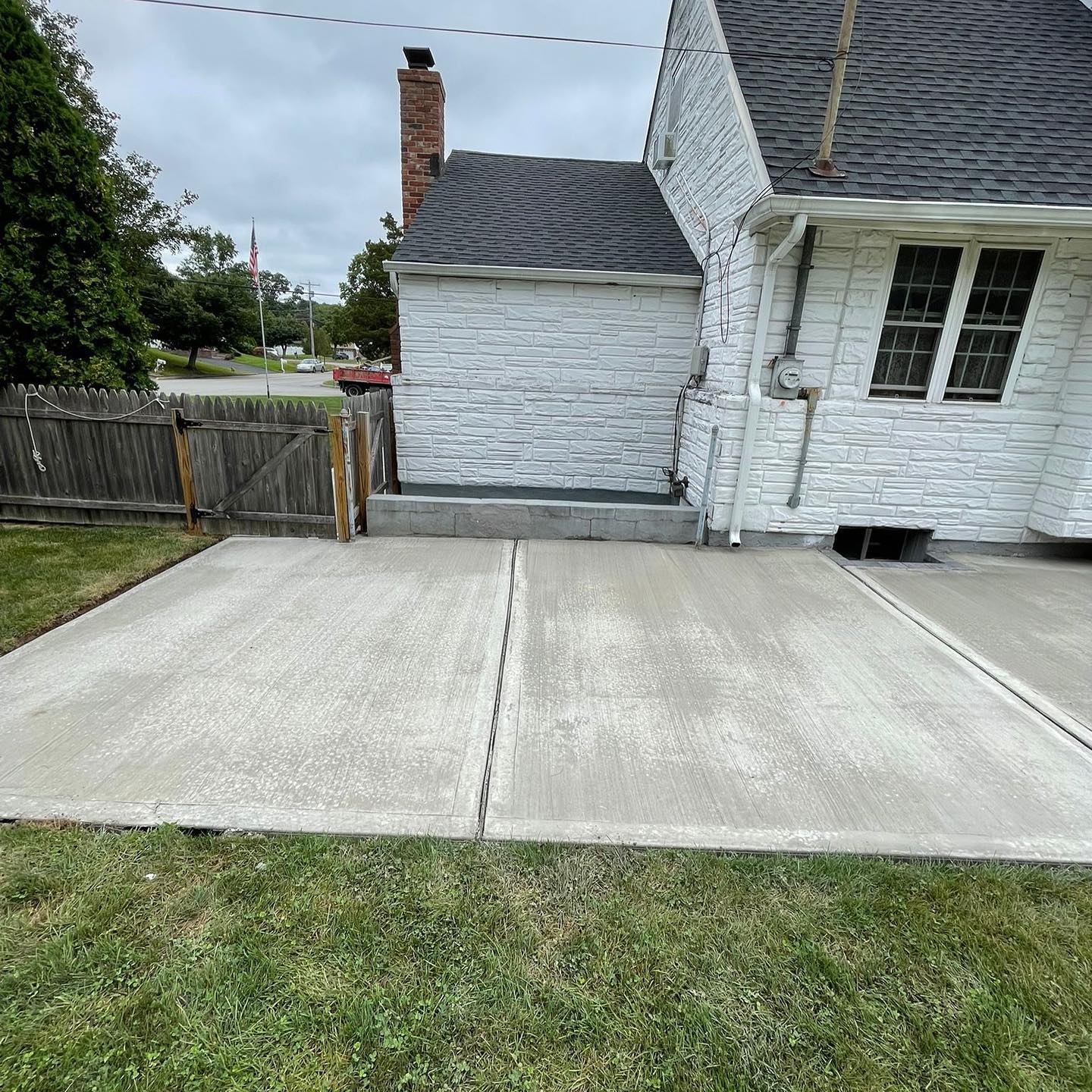 Poured concrete driveway with broom finish