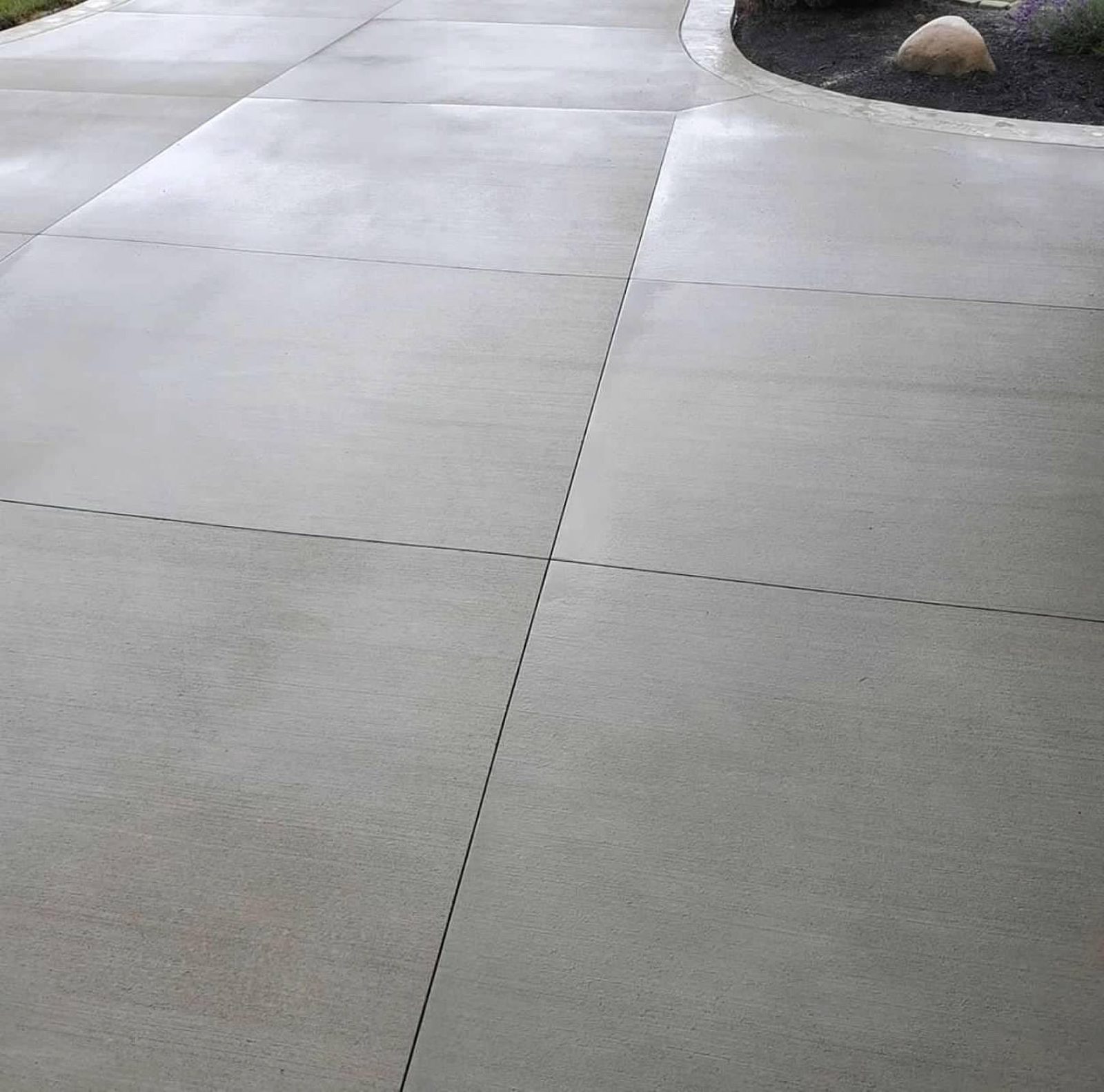 Close-up of a smooth finished concrete driveway slab